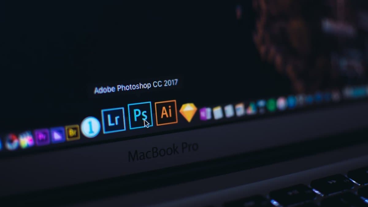 Professional video editor using Adobe Premiere Pro with PremiereCopilot plugin for automatic multicam podcast editing — Photo by Szabo Viktor on Unsplash