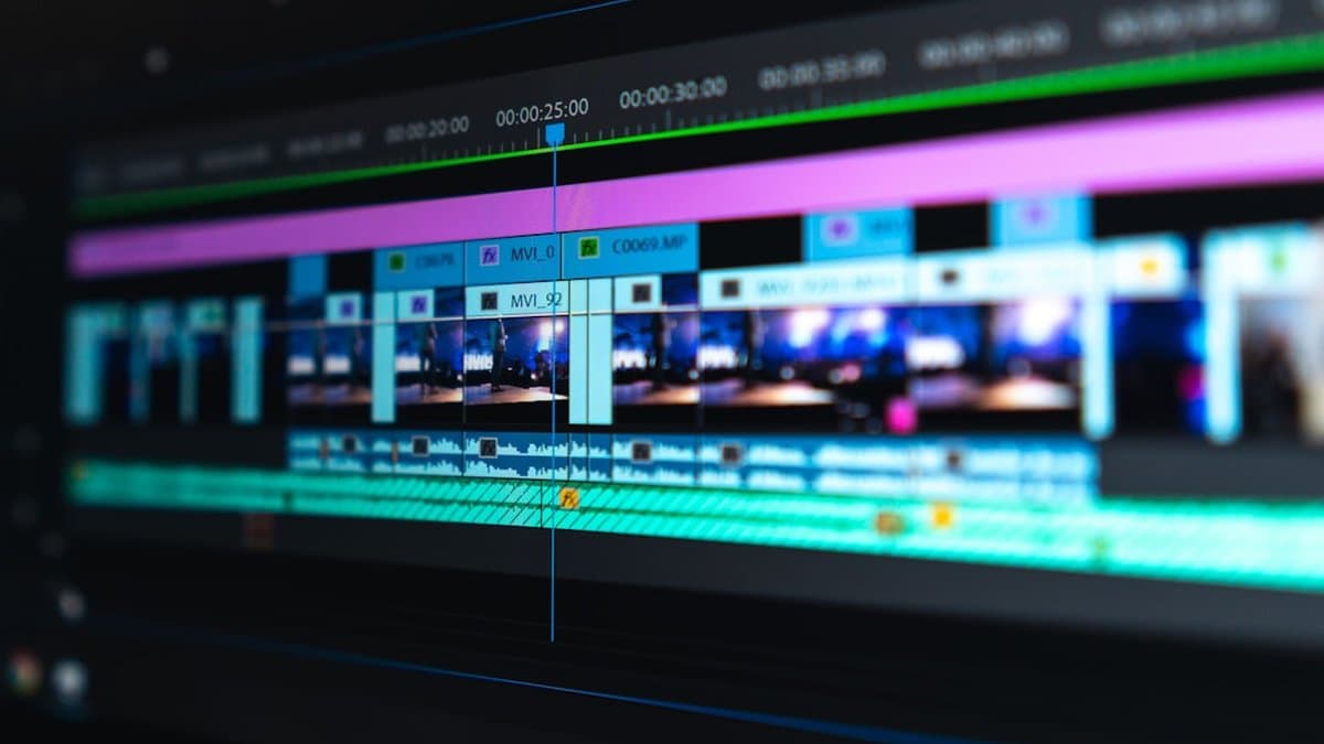 Video editor adjusting B-roll timing and transitions on editing timeline for short-form video retention — Photo by Peter Stumpf on Unsplash