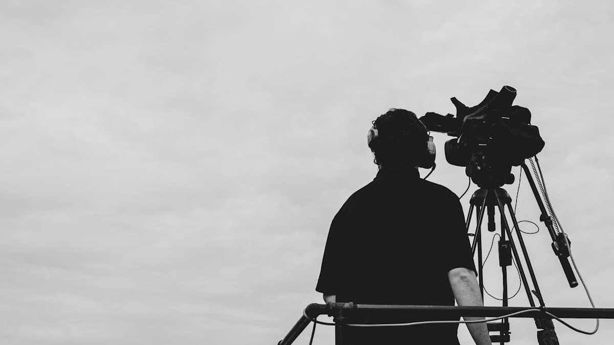 Enterprise-level video production workflow showing scalable automated processes for high-volume content creation — Photo by Sean Benesh on Unsplash