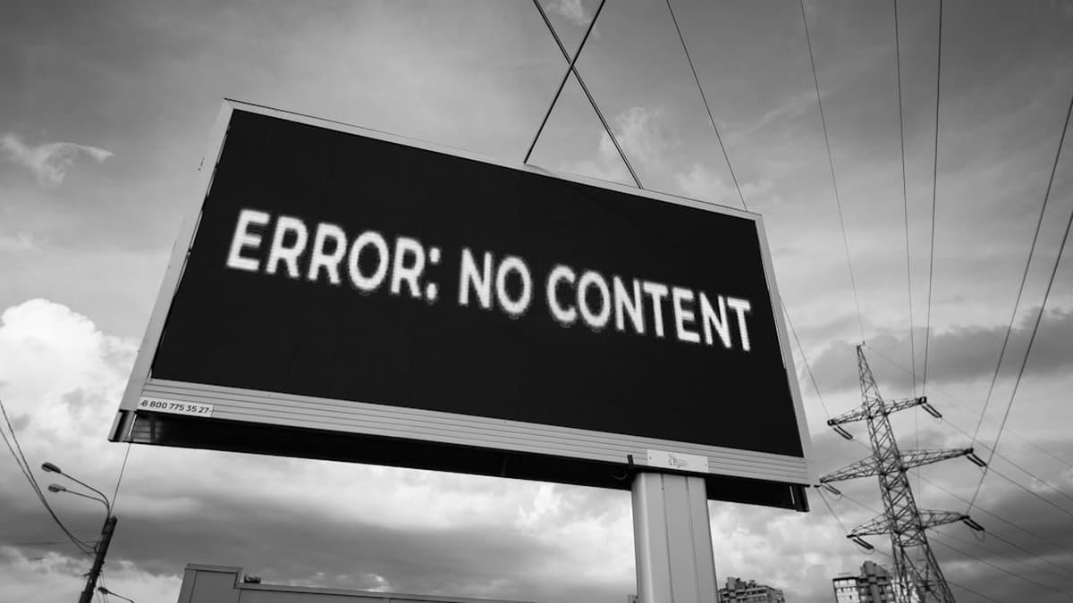 Content creator reviewing platform policy notification showing why cross-posted video was rejected due to formatting issues — Photo by Alexander Grigoryev on Unsplash