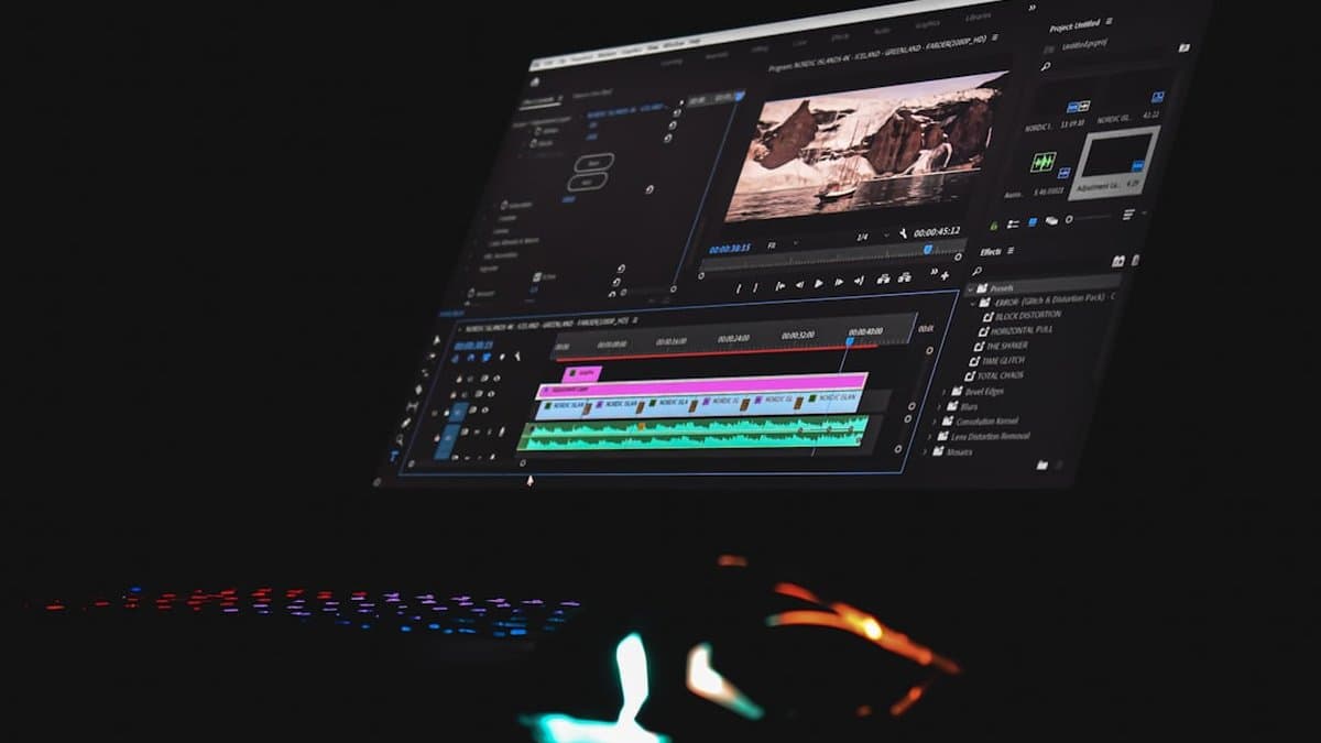 Sales rep following a simple video template script on their laptop while recording a quick, authentic short-form outreach video with minimal editing. — Photo by Sanjeev Nagaraj on Unsplash