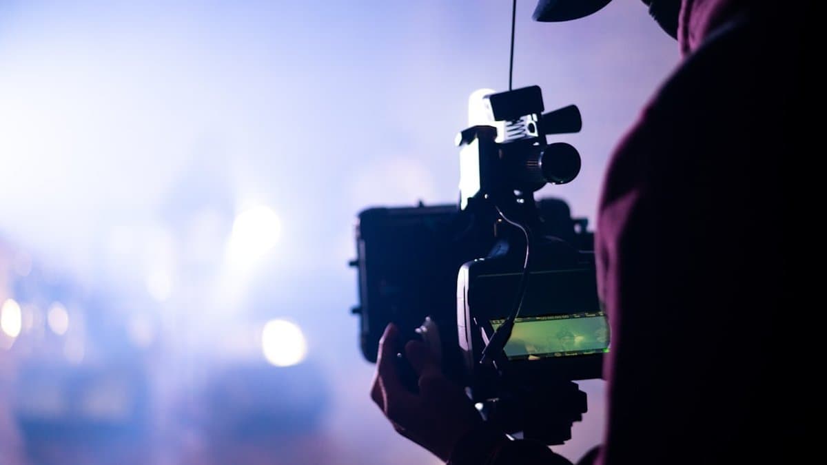 Content creator reviewing brand consistency guidelines while using AI video clipping tool to maintain uniform visual style — Photo by Harry Shelton on Unsplash