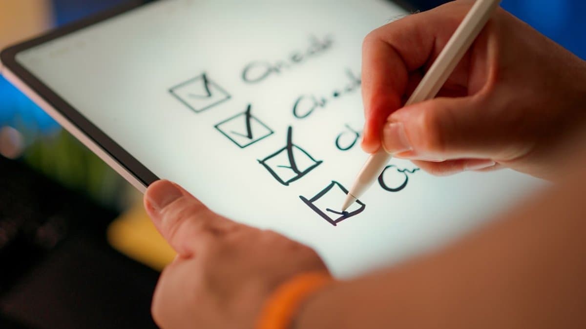 SEC compliance checklist displayed on computer screen for financial advisor video content approval process — Photo by Jakub Żerdzicki on Unsplash