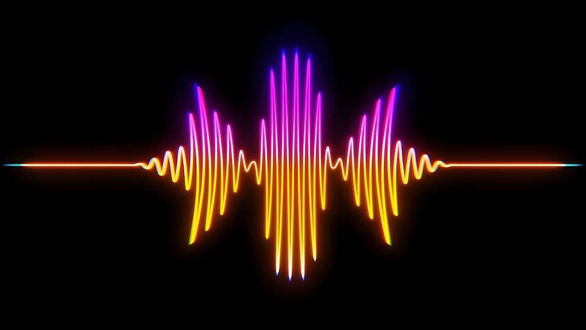 Frequency spectrum visualization showing layered audio elements across bass, midrange, and treble ranges optimized for mobile device playback — Photo by Jumping Jax on Unsplash